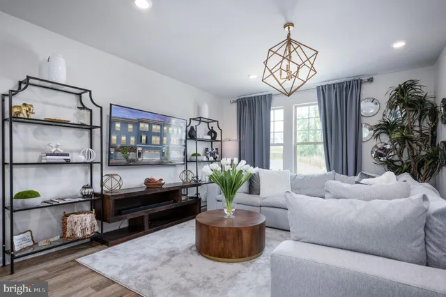 a view of a dining room with furniture and window