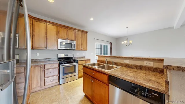 a bathroom with a glass shower door and a glass door
