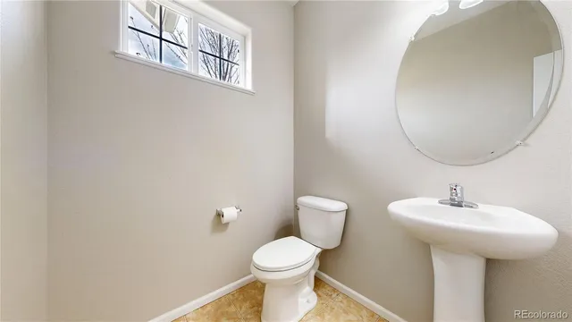 a bathroom with a granite countertop sink mirror and shower