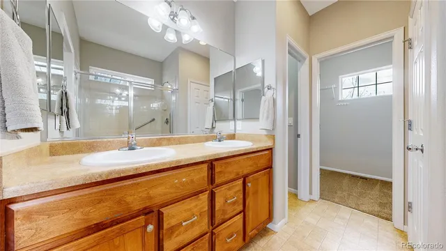 a terrace with outdoor seating and trees