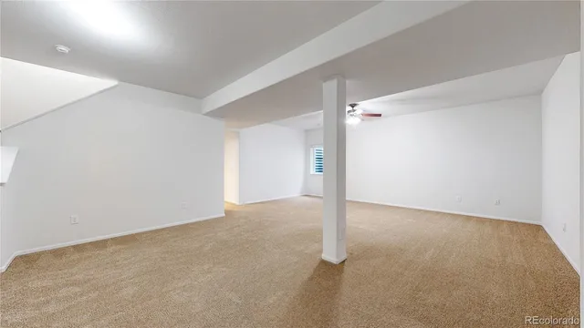 a view of a chairs and table in the patio