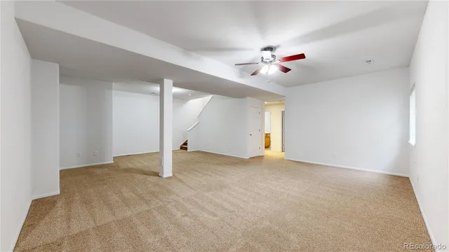 a view of a backyard with sitting area