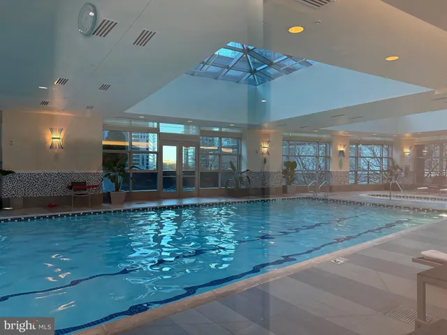 a outdoor living space with furniture and a potted plant