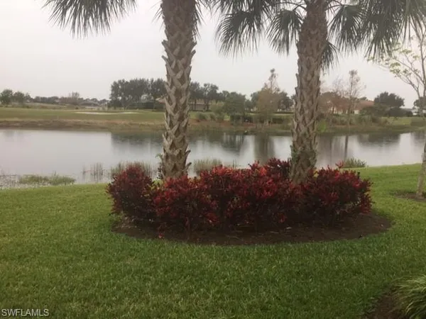 a lake view with a garden