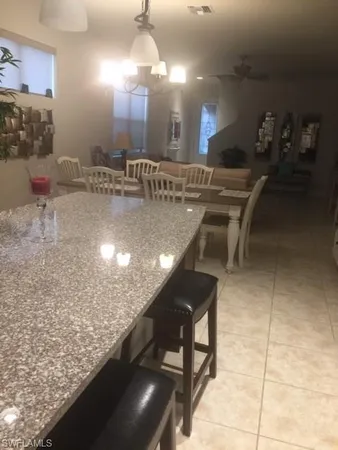 a view of a living room and bathroom