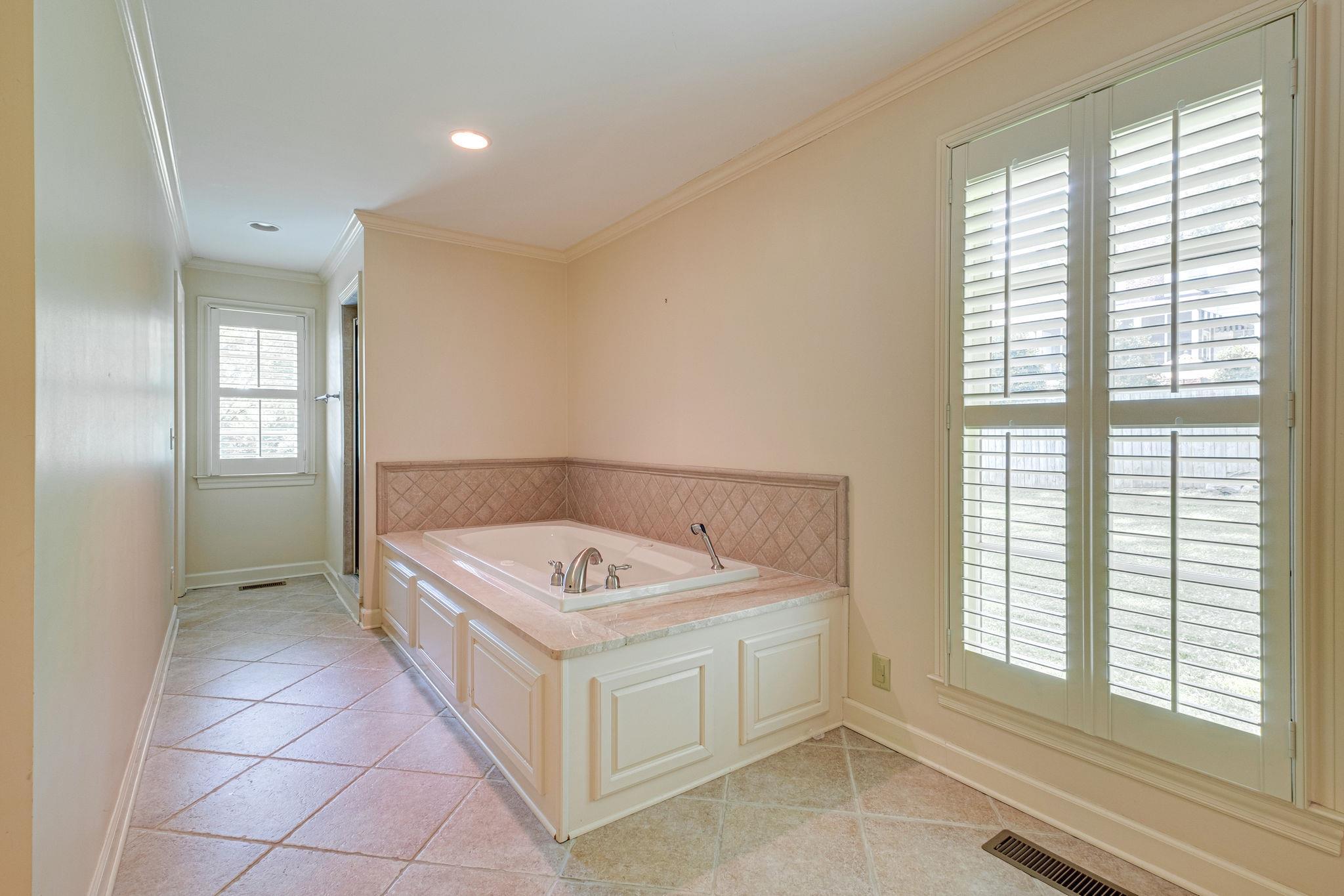 129 Cheek Road Nashville, TN 37205 - Photo 23 of 30 a utility room with a window dryer and washer
