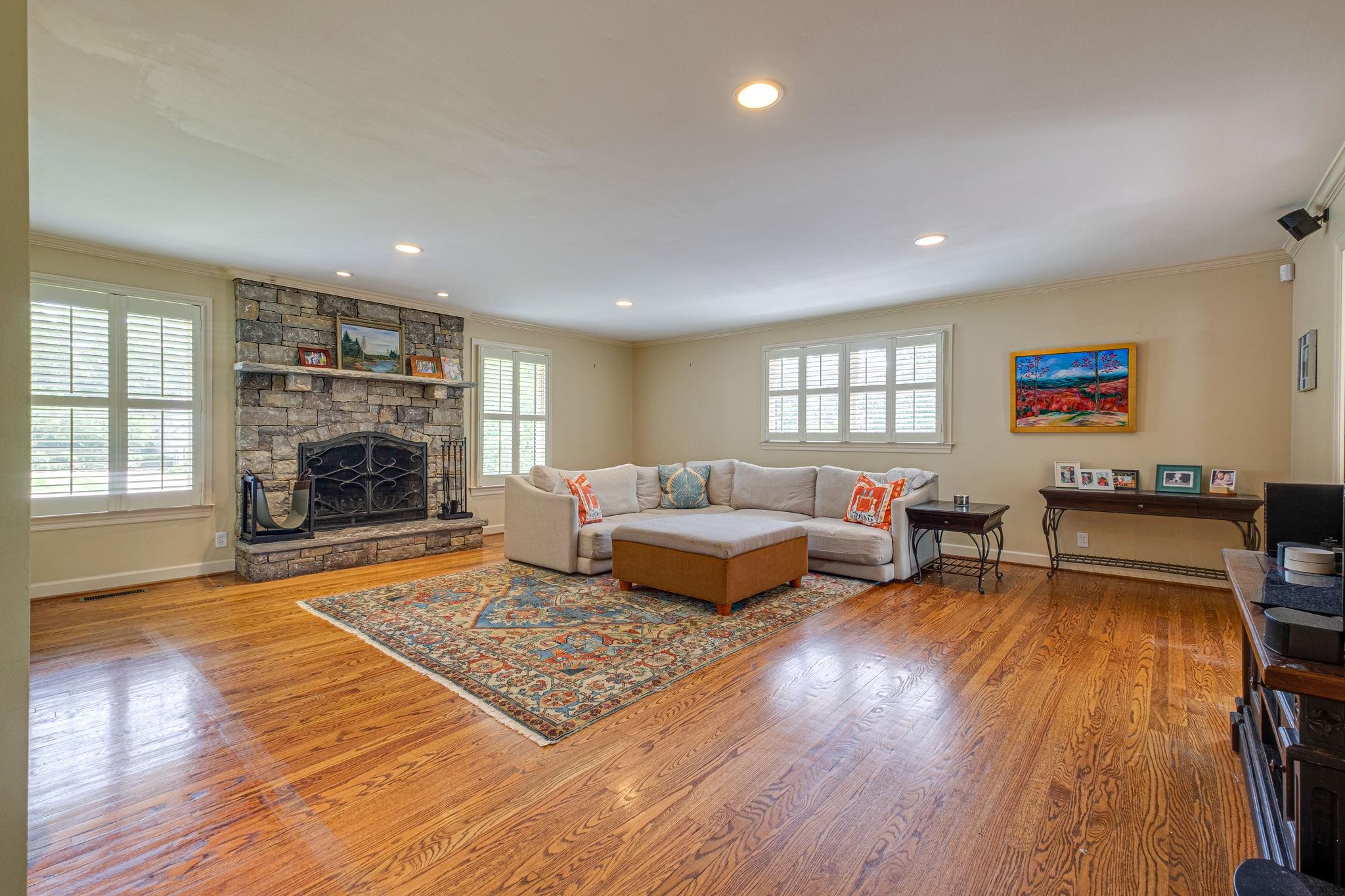129 Cheek Road Nashville, TN 37205 - Photo 25 of 30 a living room with furniture and a fireplace