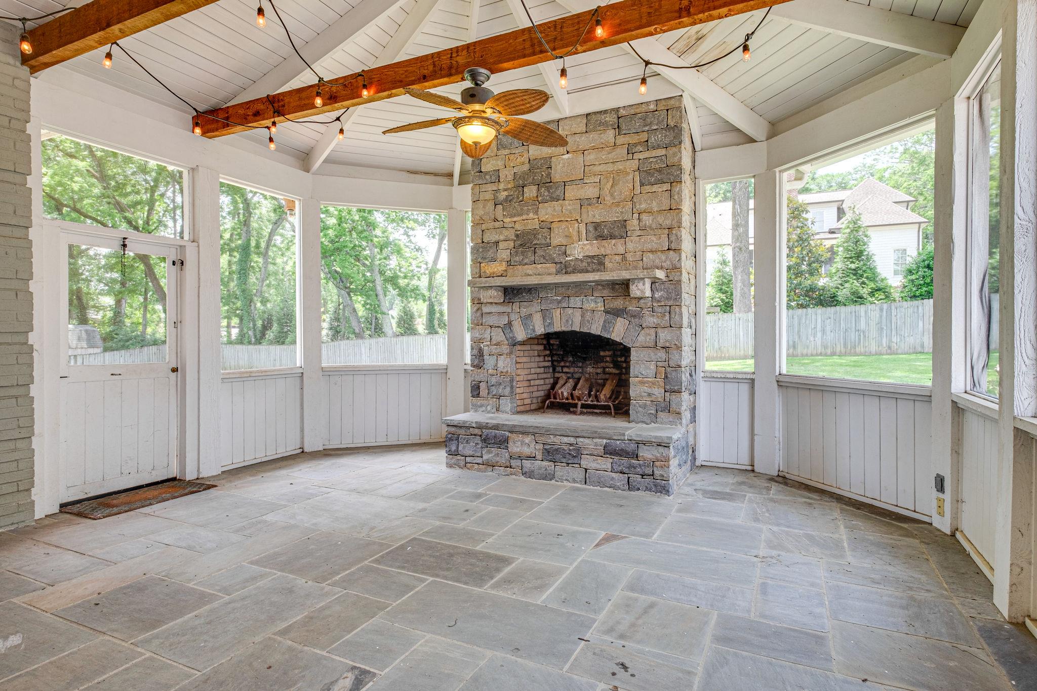 129 Cheek Road Nashville, TN 37205 - Photo 28 of 30 a living room with furniture and a fireplace