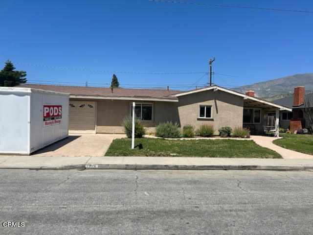 1215 Maple Street Santa Paula, CA 93060 - Photo 1 of 15 a front view of a house with a yard