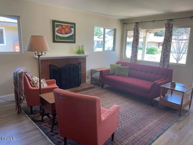 1215 Maple Street Santa Paula, CA 93060 - Photo 15 of 15 a living room with furniture and a fireplace