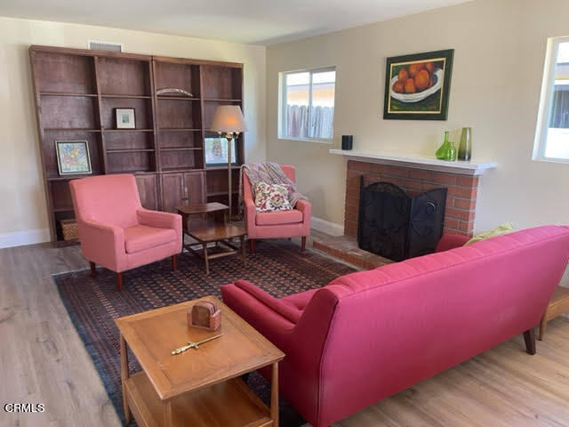 1215 Maple Street Santa Paula, CA 93060 - Photo 2 of 15 a living room with furniture and a fireplace