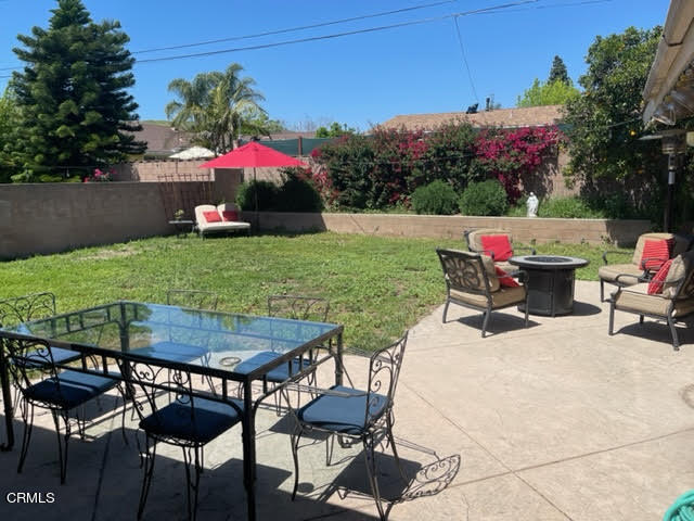 1215 Maple Street Santa Paula, CA 93060 - Photo 5 of 15 a view of an chairs and table in the patio