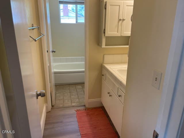 1215 Maple Street Santa Paula, CA 93060 - Photo 6 of 15 a bathroom with a shower and a sink