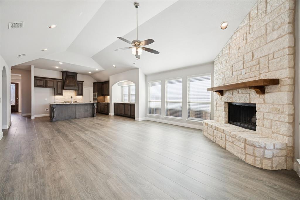1036 Sandy Hill Burleson, TX 76028 - Photo 18 of 37 a living room with furniture and a fireplace