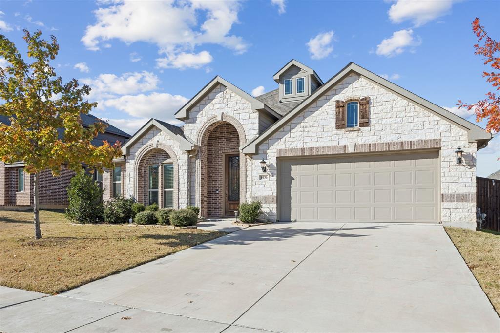 1036 Sandy Hill Burleson, TX 76028 - Photo 2 of 37 a view of a white house with a outdoor space