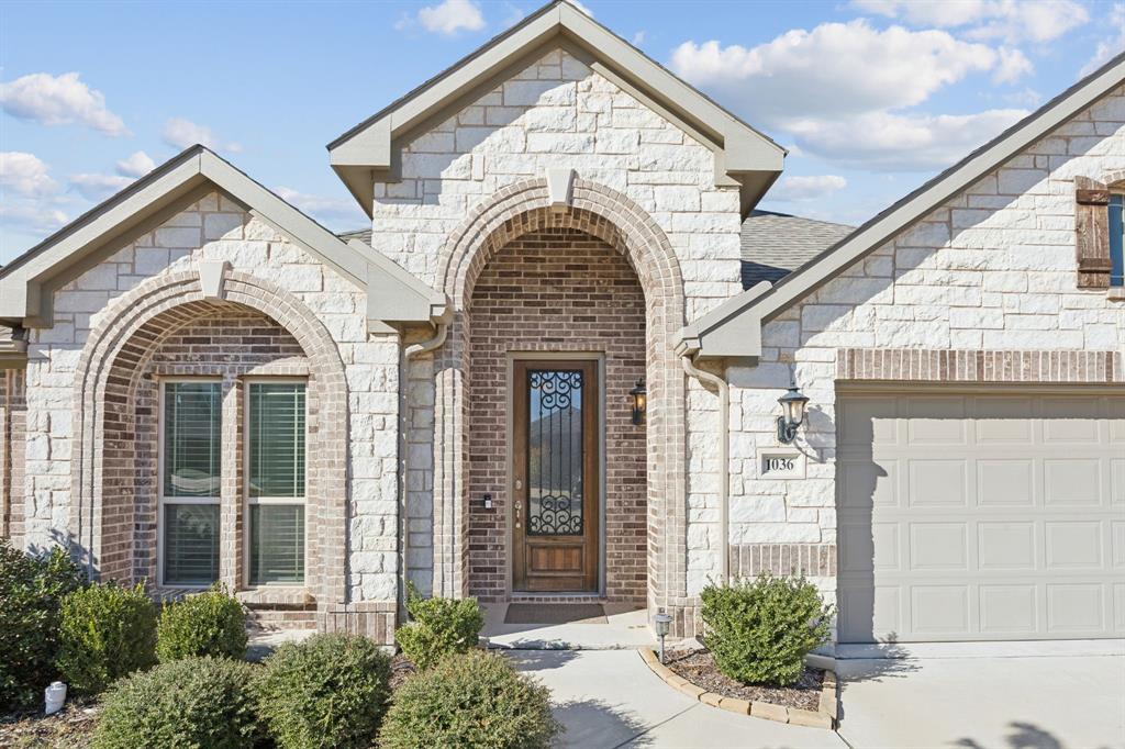 1036 Sandy Hill Burleson, TX 76028 - Photo 3 of 37 a view of a house with potted plants