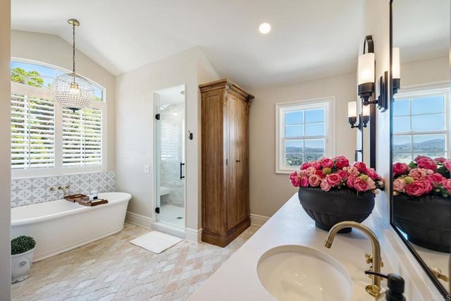 a view of a balcony with chairs