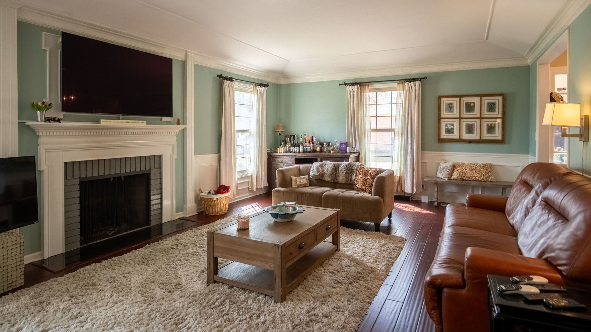 1800 Clover Road Northbrook, IL 60062 - Photo 11 of 71 a living room with furniture a fireplace and a flat screen tv