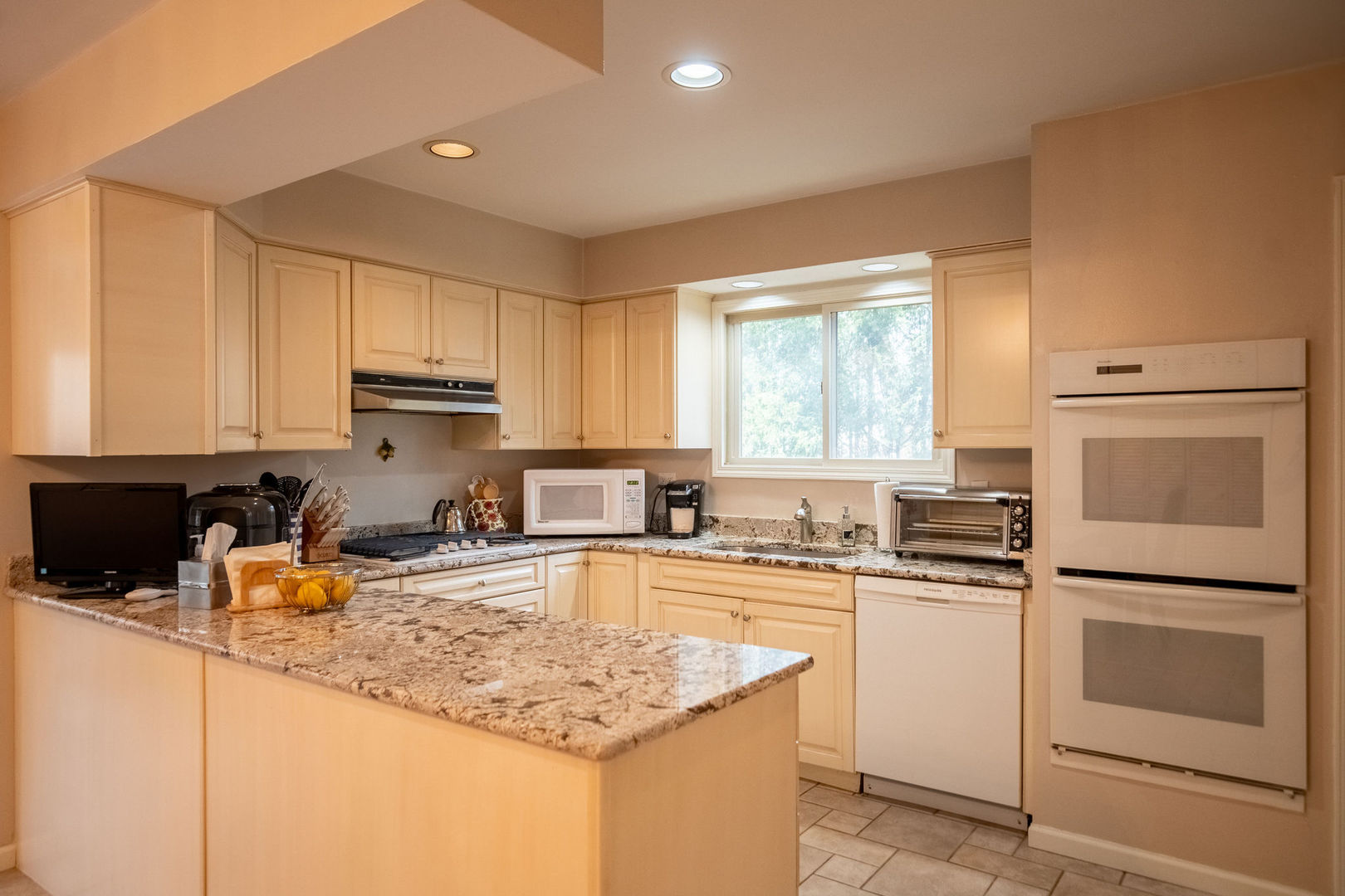 1800 Clover Road Northbrook, IL 60062 - Photo 20 of 71 a kitchen with a sink stove top oven and refrigerator