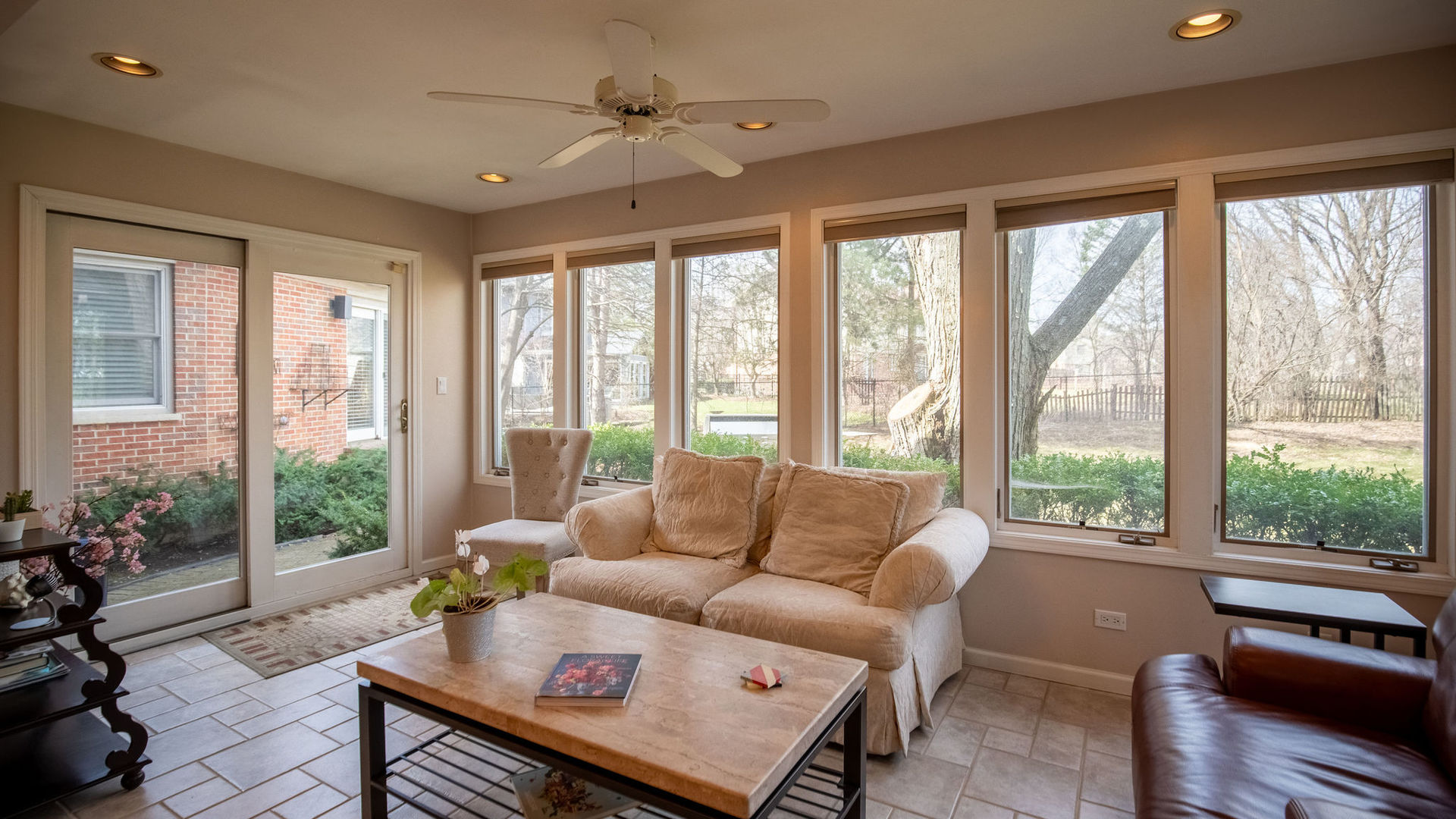 1800 Clover Road Northbrook, IL 60062 - Photo 26 of 71 a living room with furniture and a floor to ceiling window