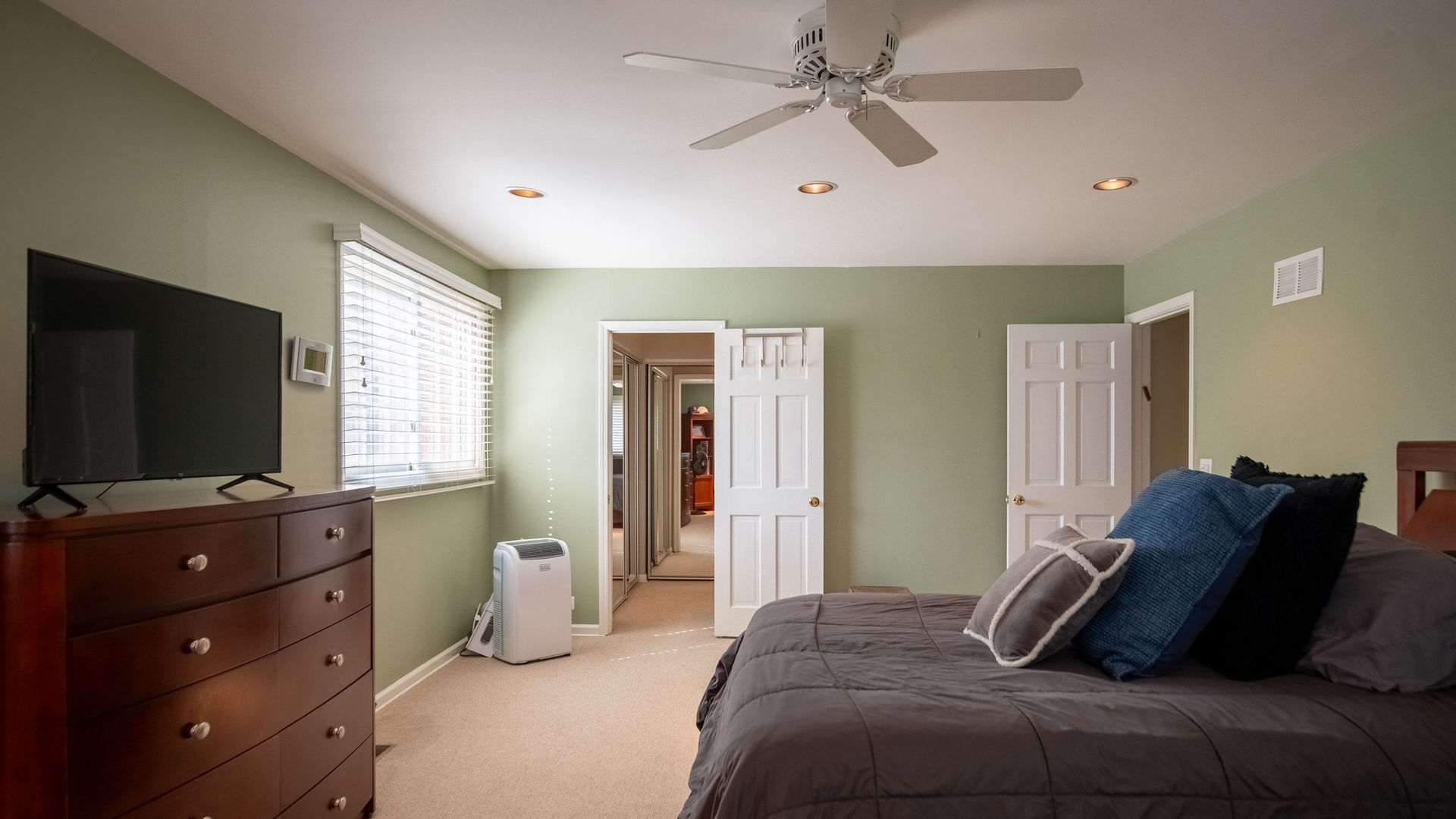 1800 Clover Road Northbrook, IL 60062 - Photo 57 of 71 a bedroom with furniture and a flat screen tv