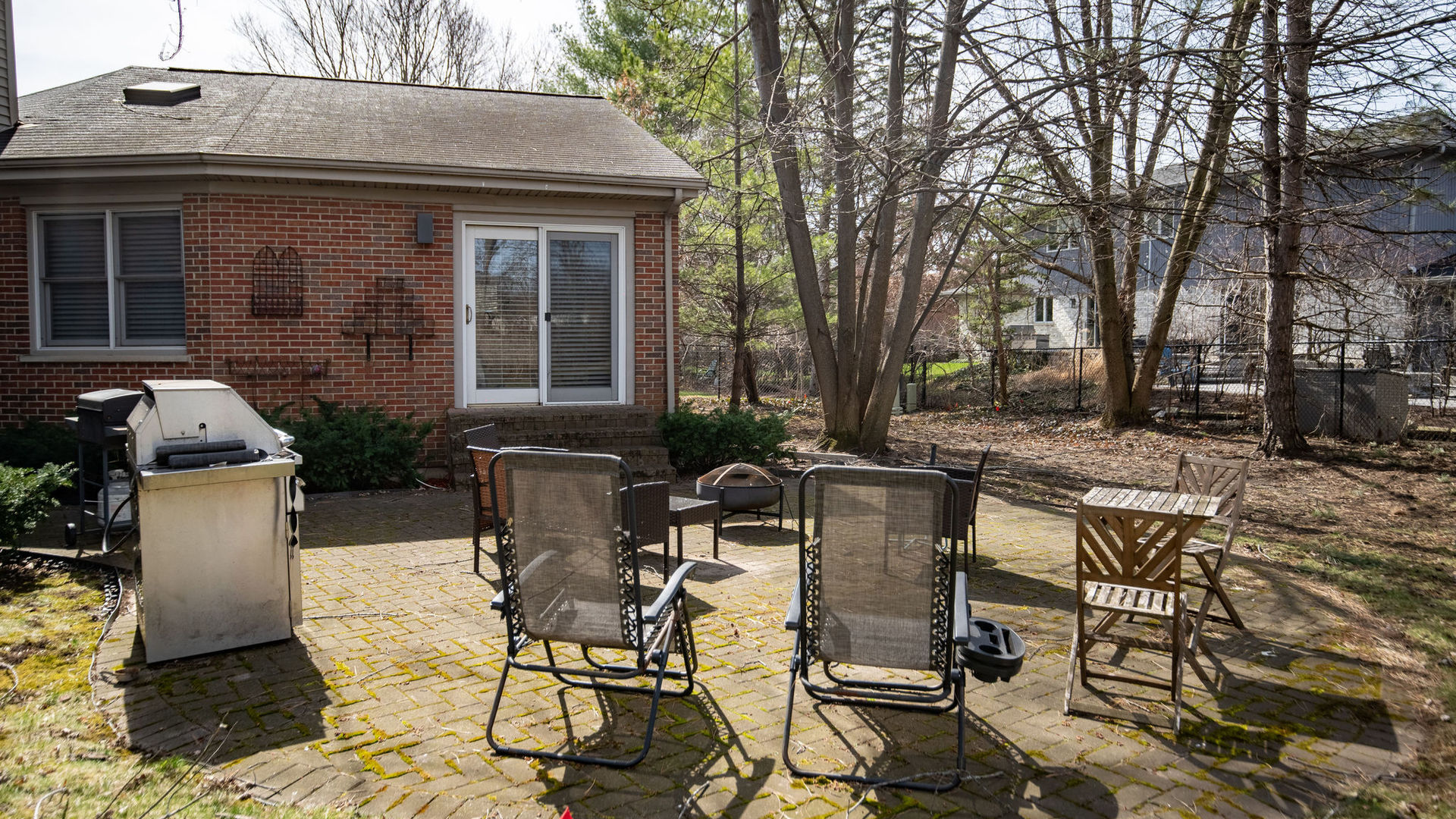 1800 Clover Road Northbrook, IL 60062 - Photo 66 of 71 a view of a patio with table and chairs and potted plants