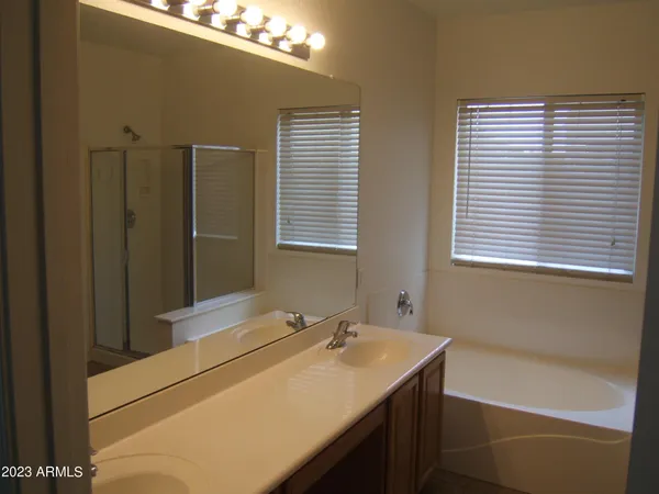 a bathroom with a sink and a bathtub