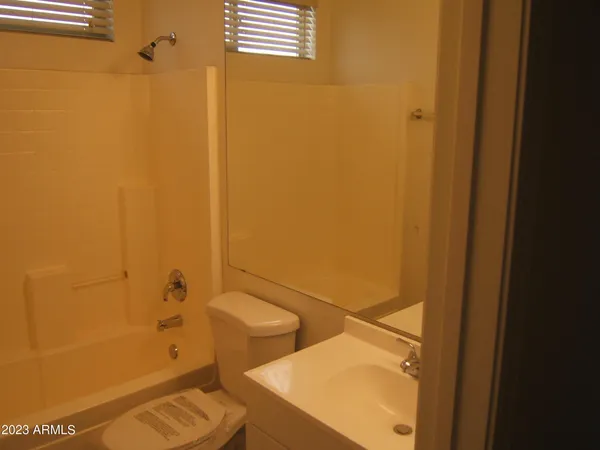 a bathroom with a bathtub and sink