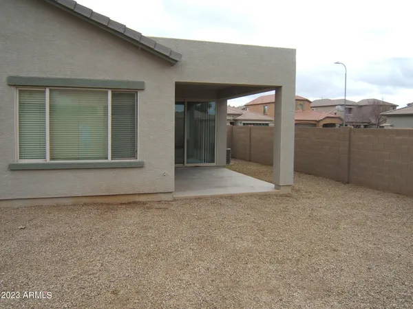 a front view of house with an outdoor space
