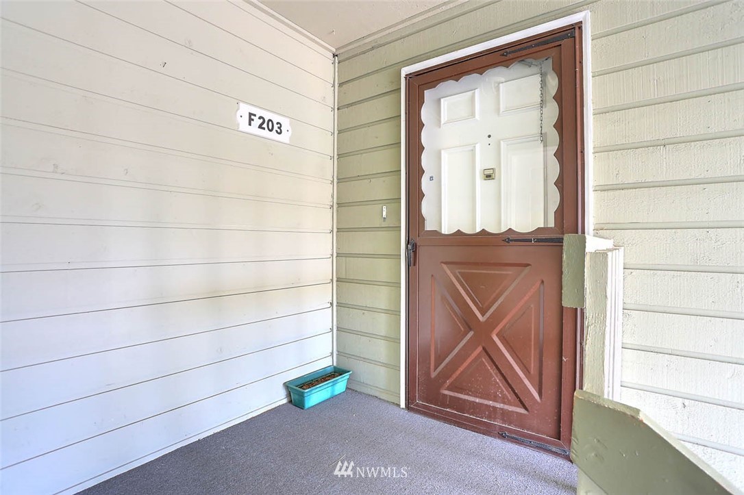 14401 Southeast Petrovitsky Road, Unit F203 Renton, WA 98058 - Photo 2 of 16 a view of front door