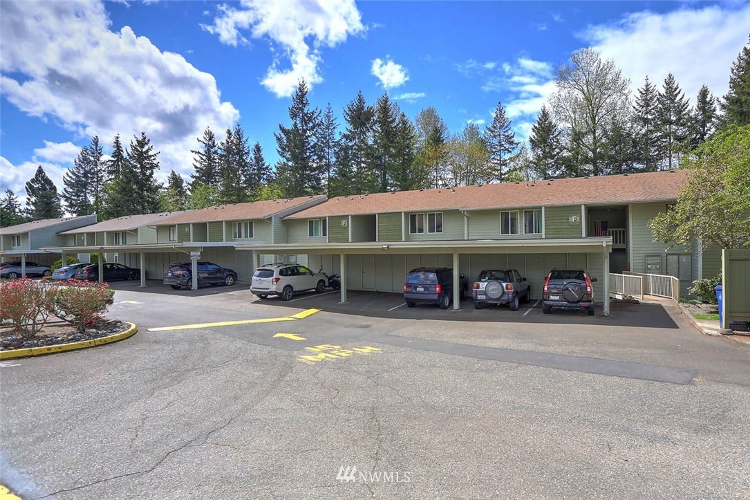 14401 Southeast Petrovitsky Road, Unit F203 Renton, WA 98058 - Photo 14 of 16 a view of a blue and white house