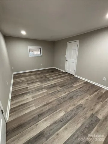 a bathroom with a sink toilet vanity and shower