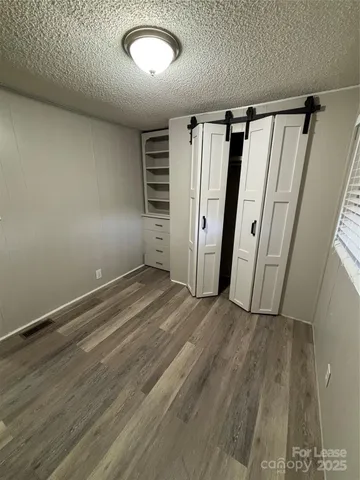 a view of empty room with front door