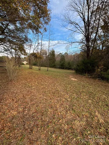 a view of a couches under an umbrella