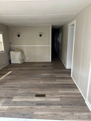 a view of a closet area with hallway
