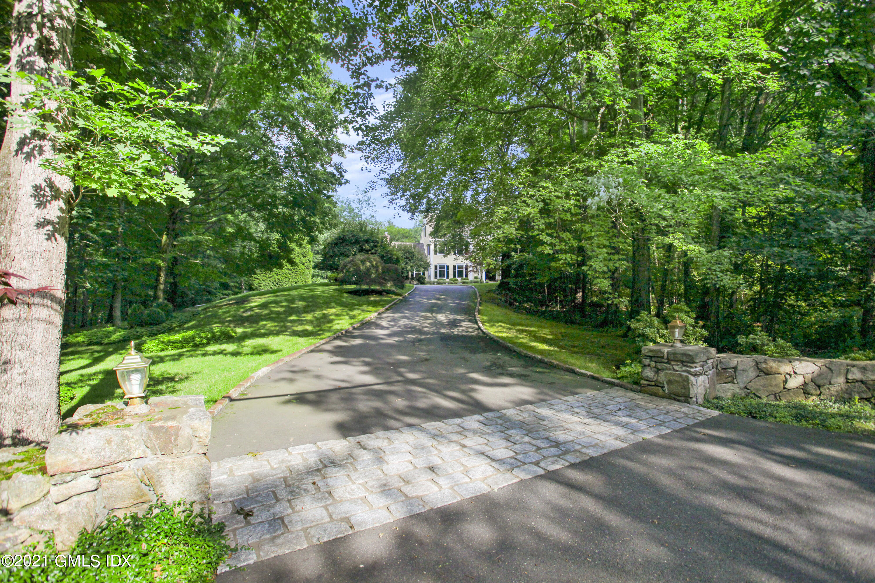 150 Porchuck Road Greenwich, CT 06831 - Photo 2 of 21 a view of path with green space