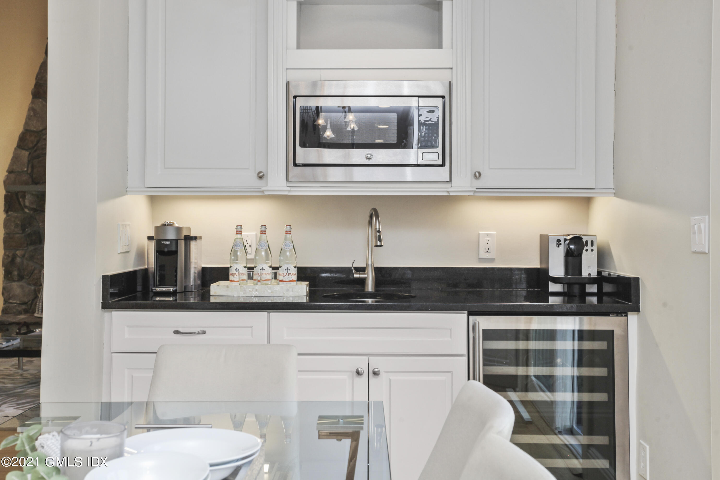 150 Porchuck Road Greenwich, CT 06831 - Photo 10 of 21 a kitchen with granite countertop a sink and cabinets