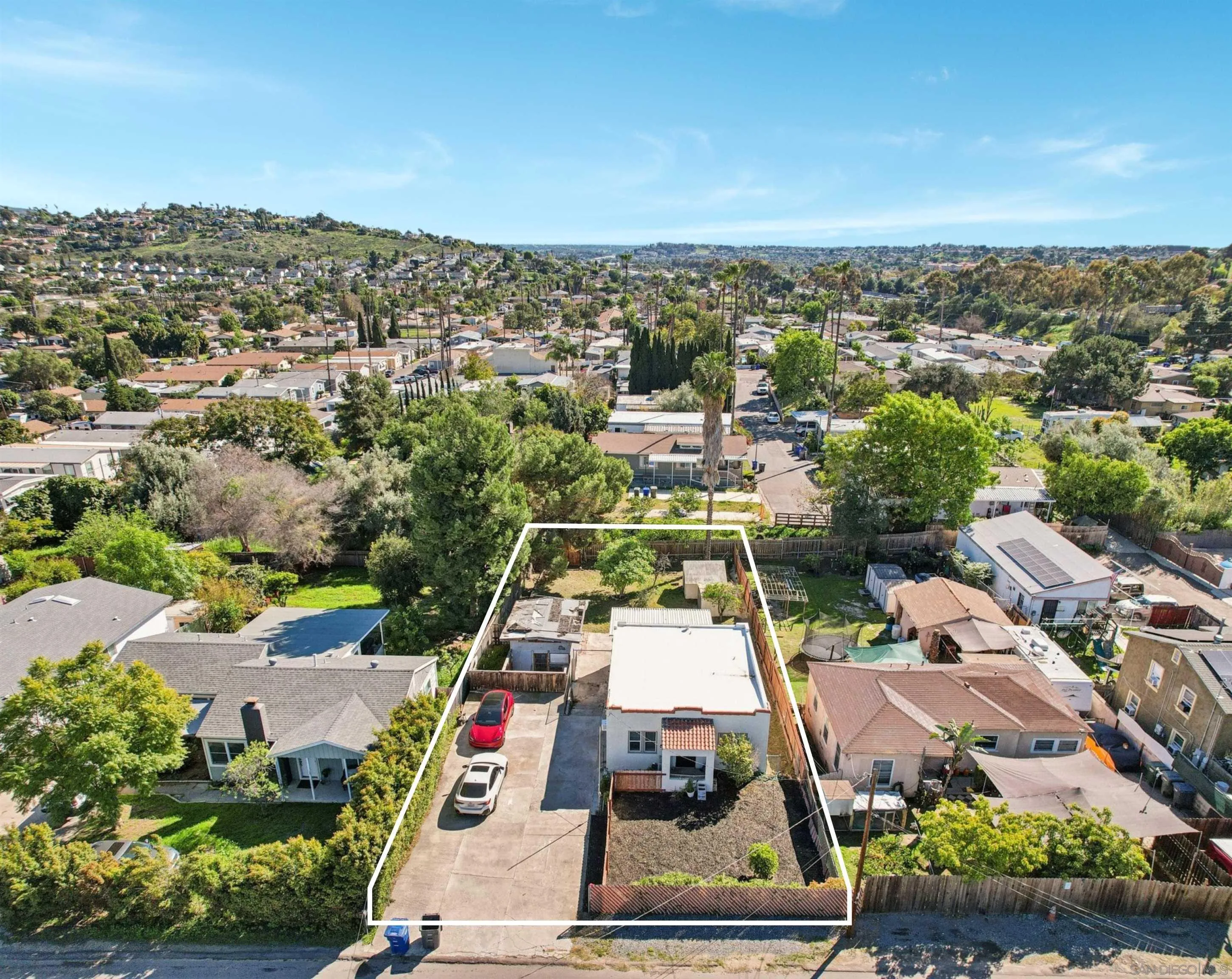 8655 Valencia Street Spring Valley, CA 91977 - Photo 1 of 14 an aerial view of a houses with a city