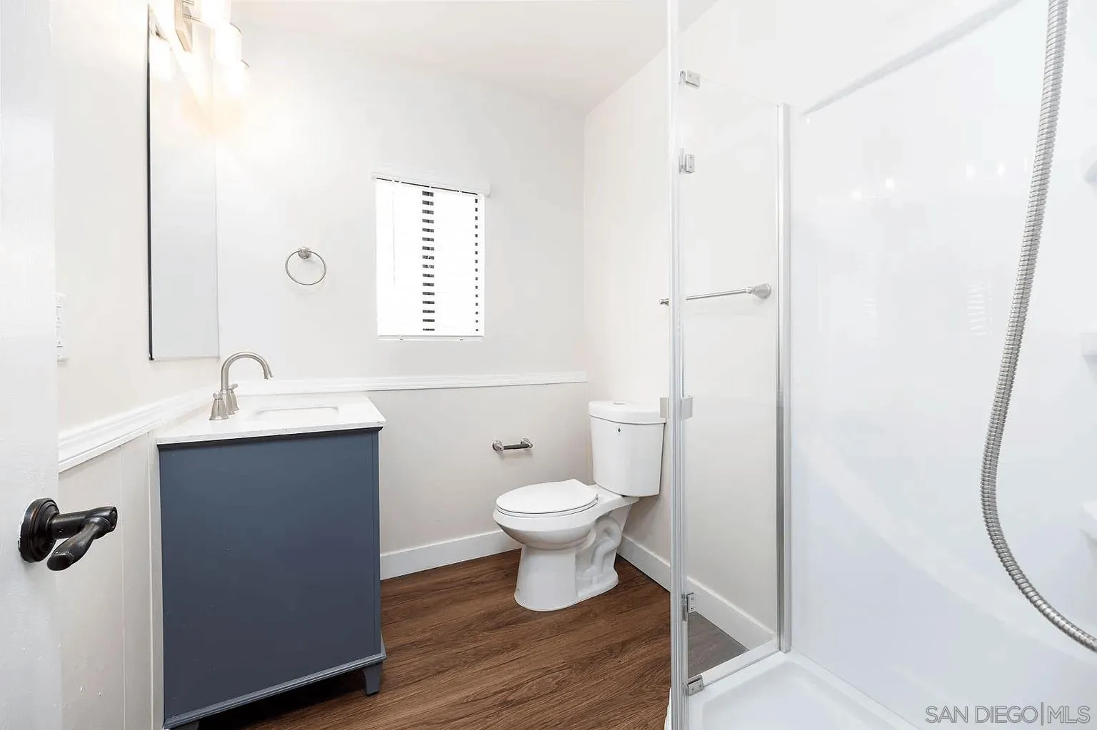 8655 Valencia Street Spring Valley, CA 91977 - Photo 5 of 14 a bathroom with a sink toilet and shower