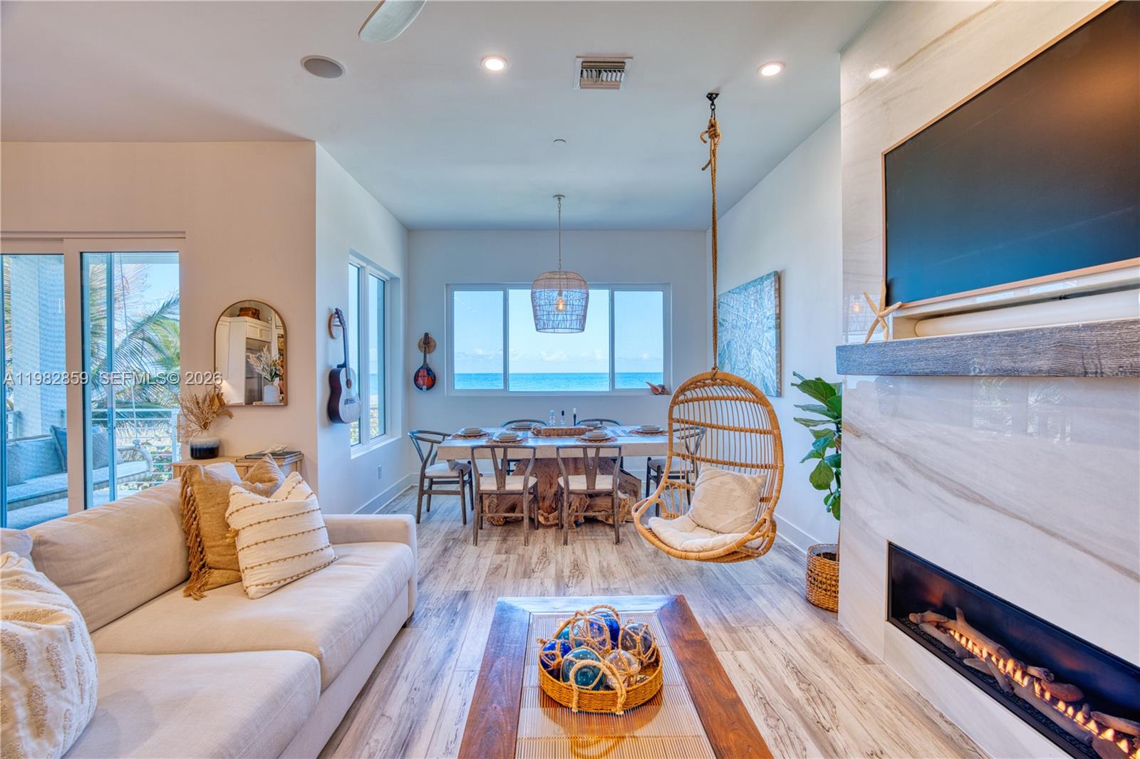 5120 Watersong Way Fort Pierce, FL 34949 - Photo 15 of 70 a living room with furniture and wooden floor