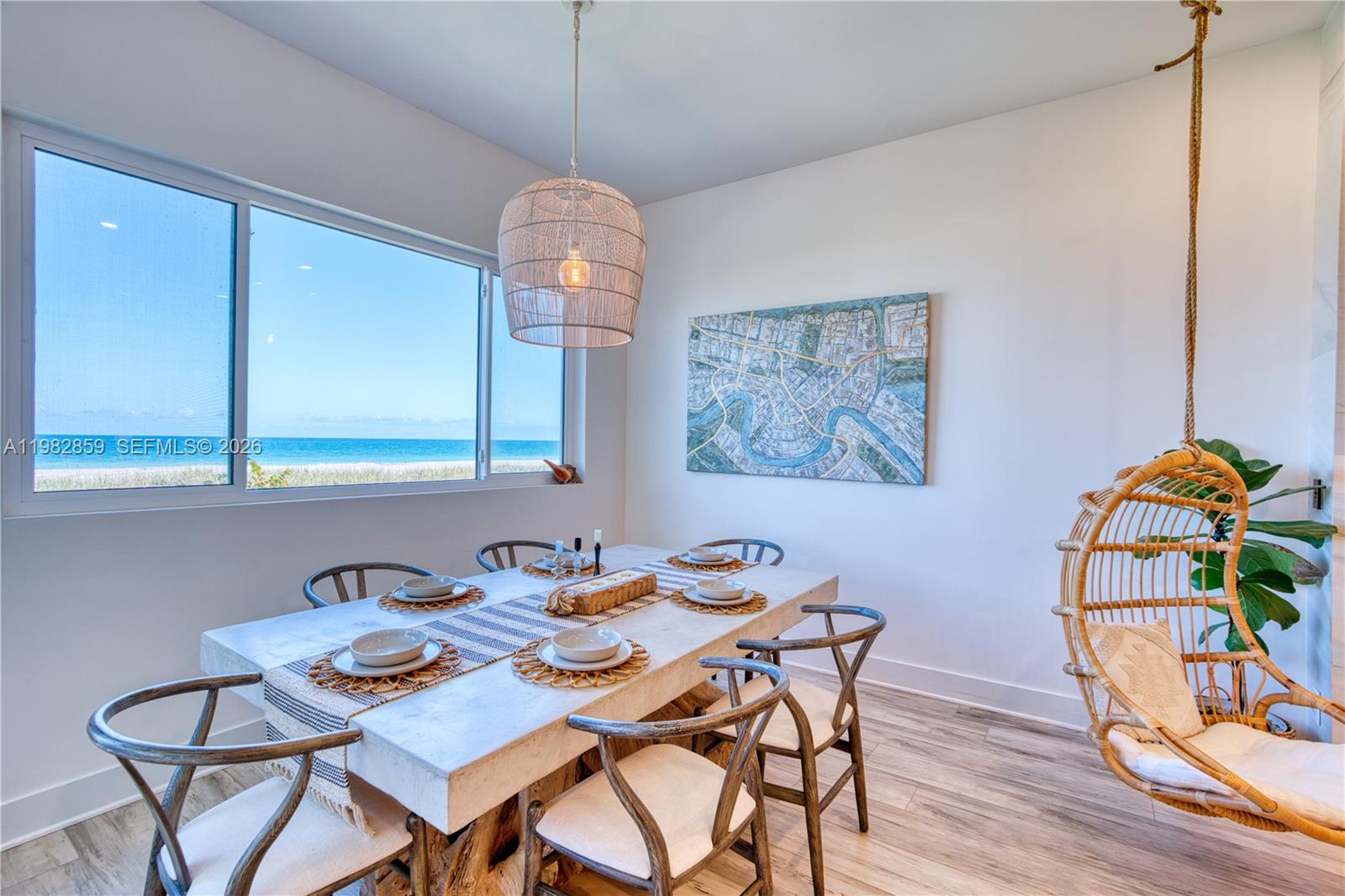 5120 Watersong Way Fort Pierce, FL 34949 - Photo 19 of 70 a dining room with furniture and wooden floor