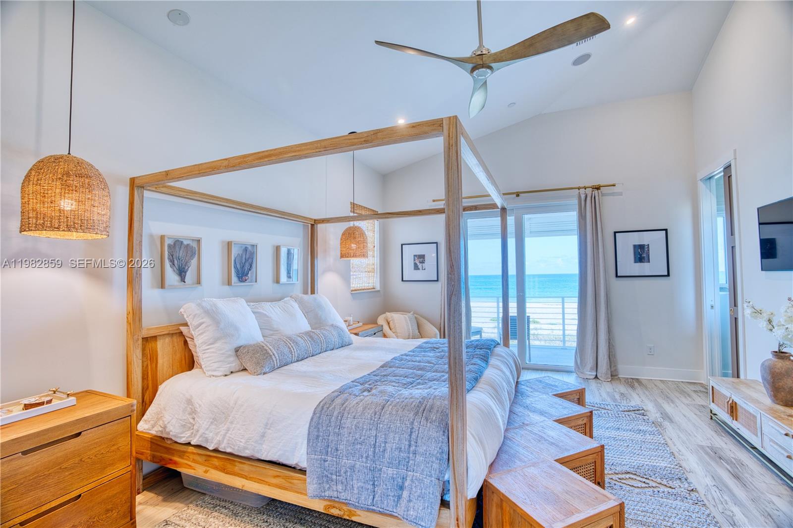 5120 Watersong Way Fort Pierce, FL 34949 - Photo 25 of 70 a bedroom with a bed and wooden floor