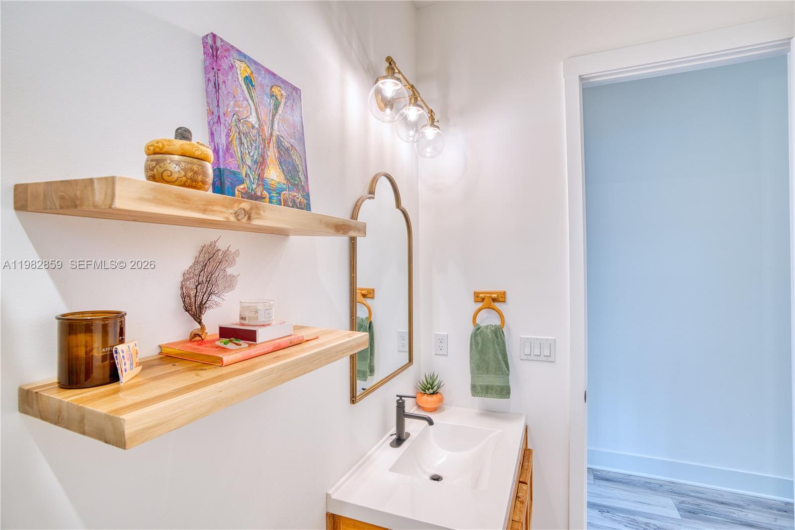 5120 Watersong Way Fort Pierce, FL 34949 - Photo 39 of 70 a bathroom with a sink and a mirror