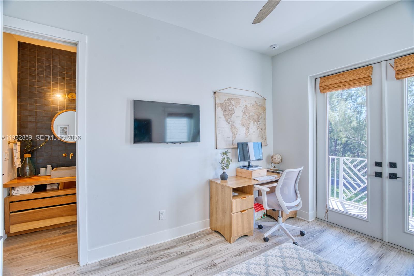5120 Watersong Way Fort Pierce, FL 34949 - Photo 45 of 70 a work room with furniture and a wooden floor