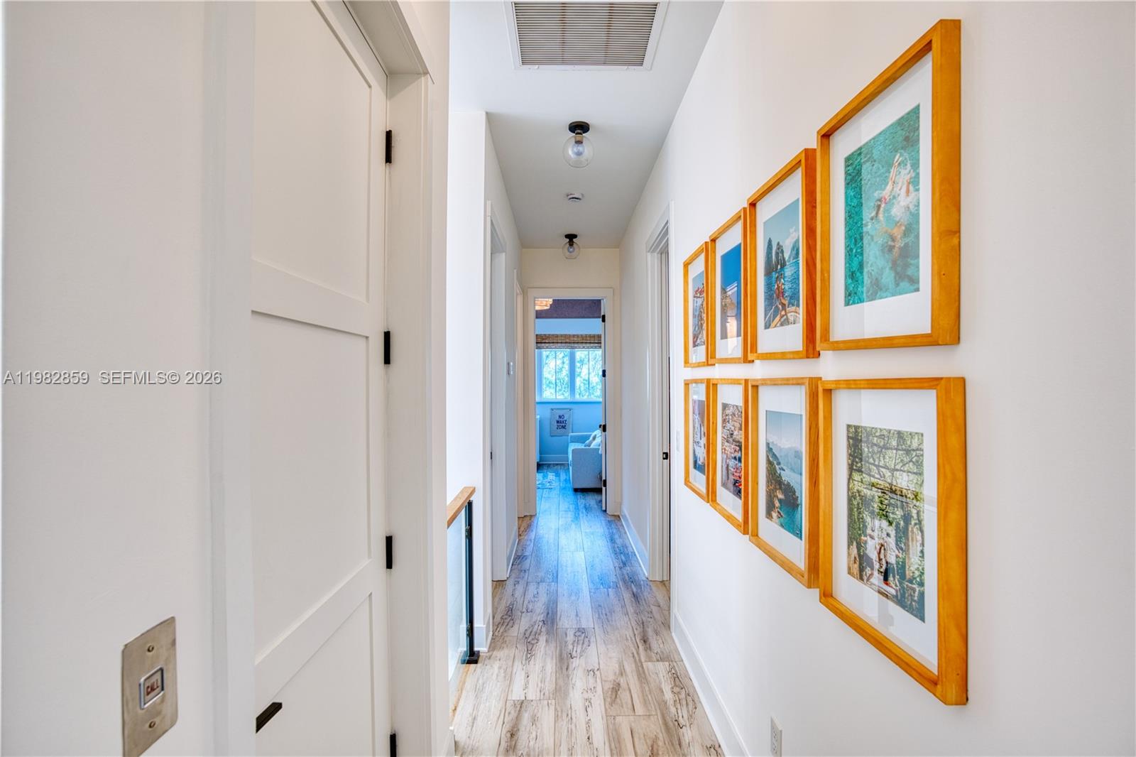 5120 Watersong Way Fort Pierce, FL 34949 - Photo 50 of 70 a view of hallway with wooden floor and stairs