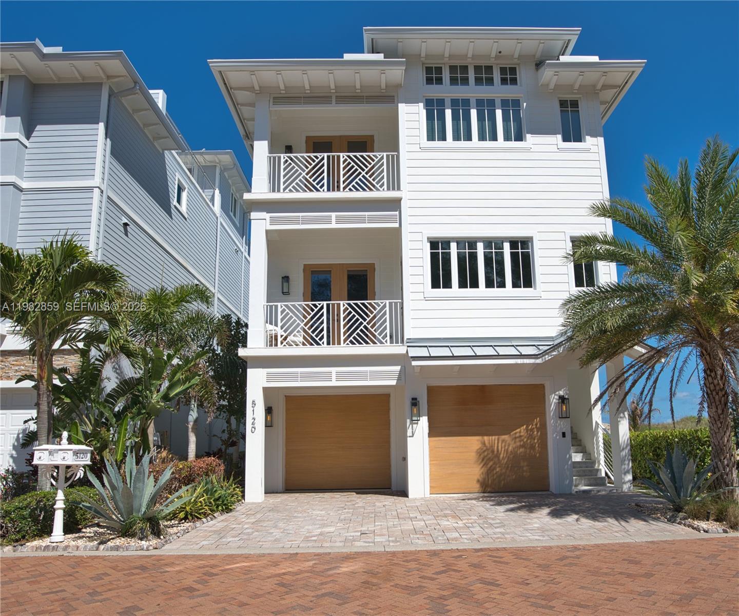5120 Watersong Way Fort Pierce, FL 34949 - Photo 67 of 70 a front view of a house with a yard