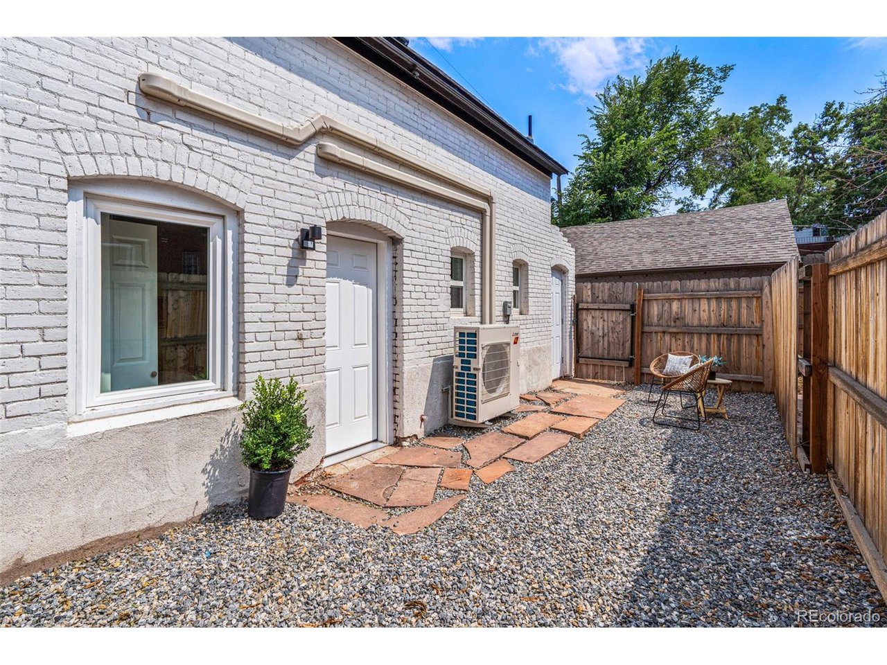 20 South Sherman Street Denver, CO 80209 - Photo 22 of 36 a view of a house with backyard and sitting area
