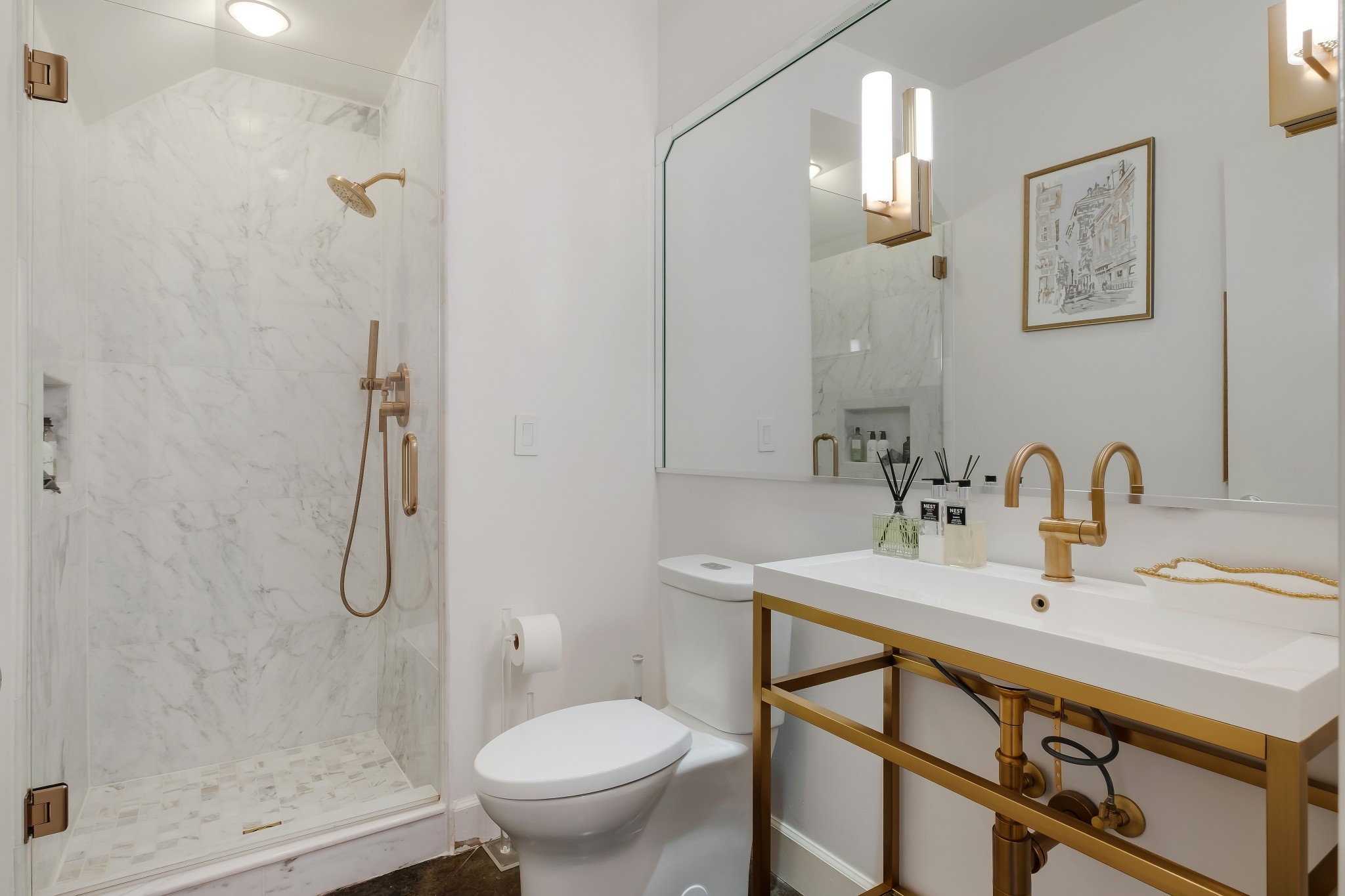 3014 Hedrick Street, Unit 504 Nashville, TN 37203 - Photo 18 of 33 a bathroom with a sink toilet and shower