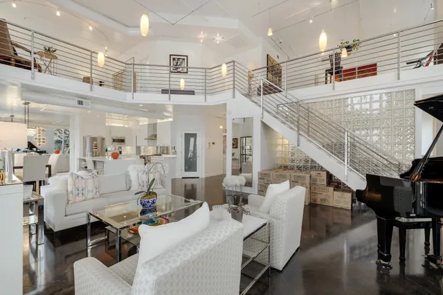 a very nice looking dining room with a table and chairs