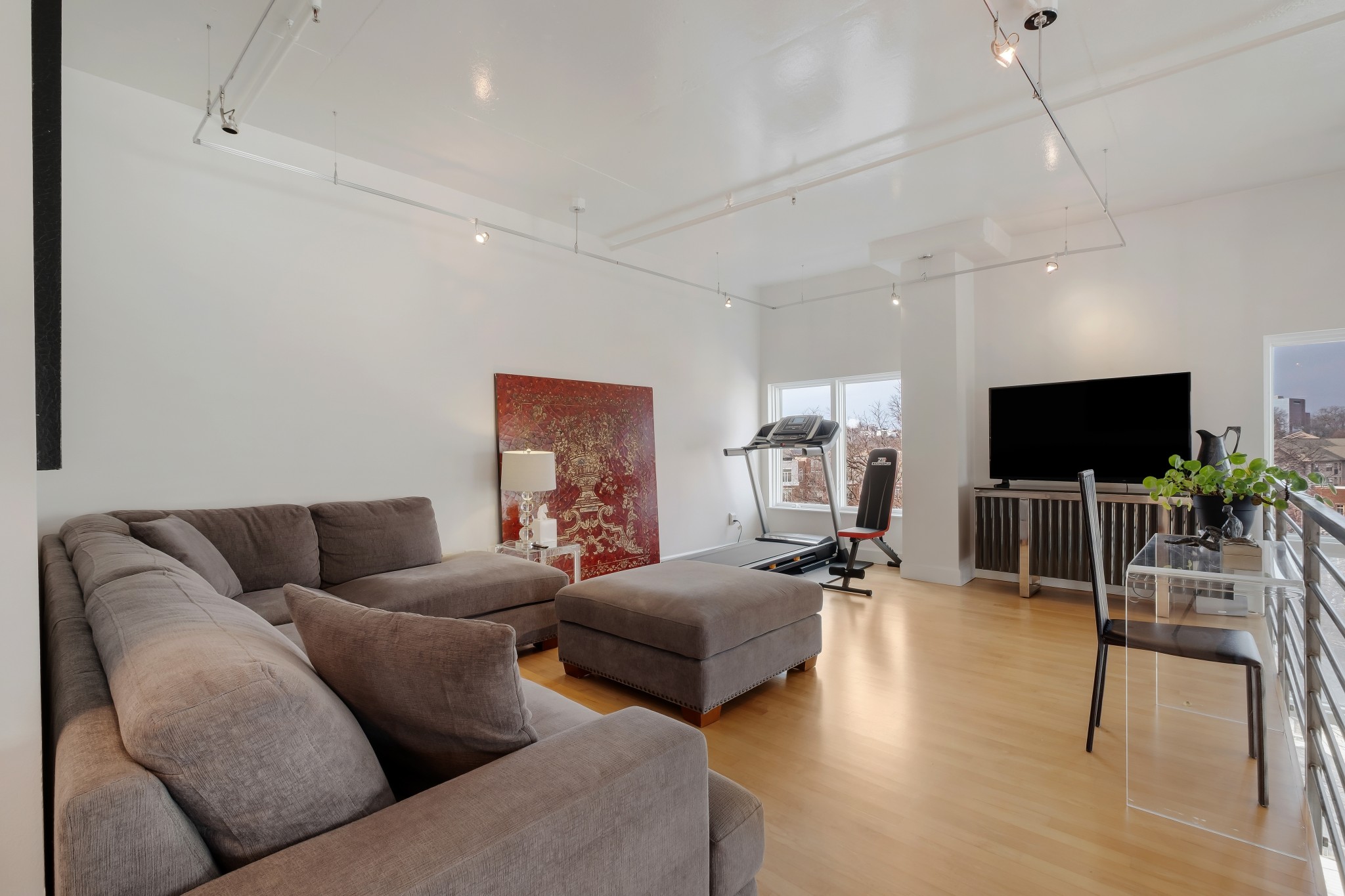 3014 Hedrick Street, Unit 504 Nashville, TN 37203 - Photo 23 of 33 a living room with furniture and a flat screen tv